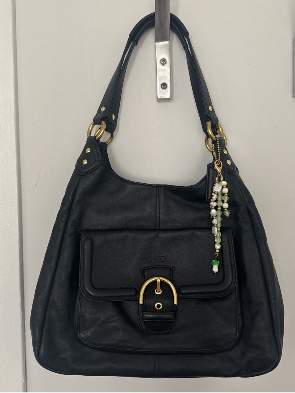 Coach Black Leather Shoulder Bag with Gold-Tone Hardware and Front Pocket